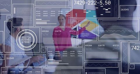 Businesswoman presenting data to team using interactive hud dashboards and visual analytics