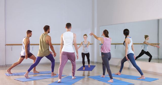 Diverse Group Engaging in Yoga Class in Studio - Download Free Stock Images Pikwizard.com