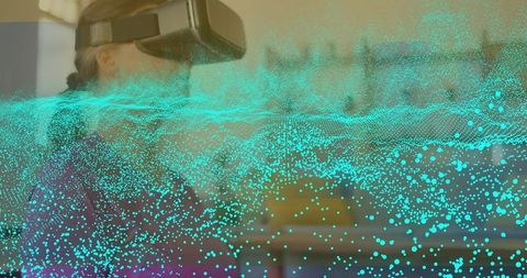 Woman exploring virtual reality data field with futuristic turquoise overlay