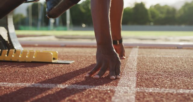 Athlete Preparing for Sprint Race at Starting Line - Download Free Stock Images Pikwizard.com