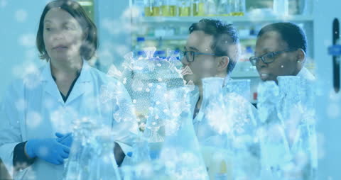 Diverse Scientists Analyzing Viral Data in Laboratory