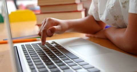 Child Engaged with Online Learning on Laptop in Classroom - Download Free Stock Images Pikwizard.com