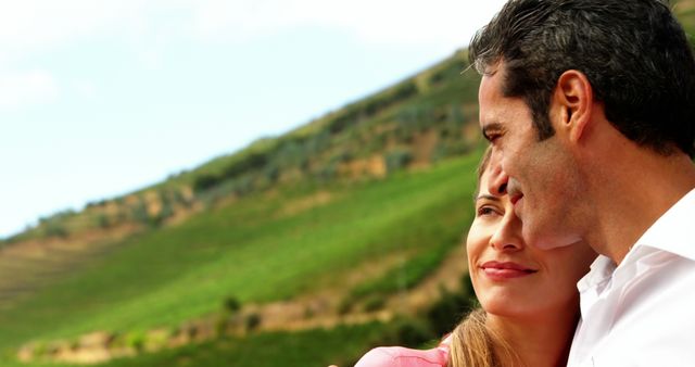 Slow motion of happy couple cuddling in field - Download Free Stock Photos Pikwizard.com