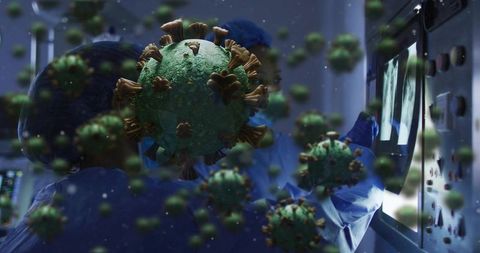 Floating virus particles over radiology team reviewing scans in hospital imaging room