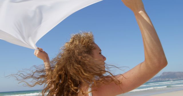 Woman Enjoying Sunny Beach with White Fabric - Download Free Stock Images Pikwizard.com