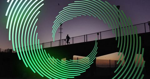 Silhouette of Runner on Promenade with Digital Green Overlay