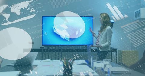 Businesswoman Analyzing Financial Data on Interactive Screen