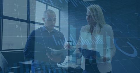Business Professionals Discussing Financial Data Analysis in Modern Office - Download Free Stock Images Pikwizard.com
