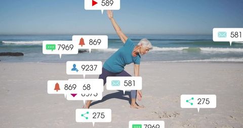 Senior Woman Performing Yoga with Social Media Notifications