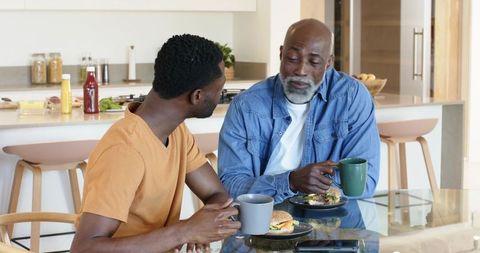 Father and Son Bonding Over Breakfast and Conversation