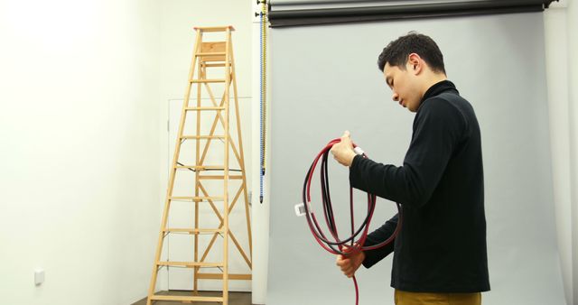 Photographer Preparing Equipment in Standalone Studio - Download Free Stock Images Pikwizard.com