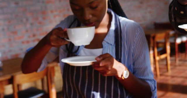 Barista Smelling Freshly Brewed Coffee in Cozy Café - Download Free Stock Images Pikwizard.com