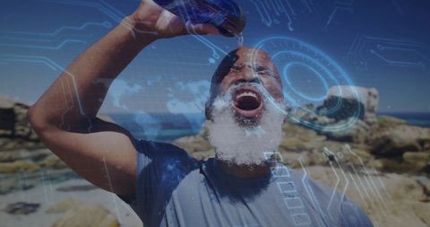 Senior Hiker Refreshing on Rocky Coast with Augmented Reality Overlay