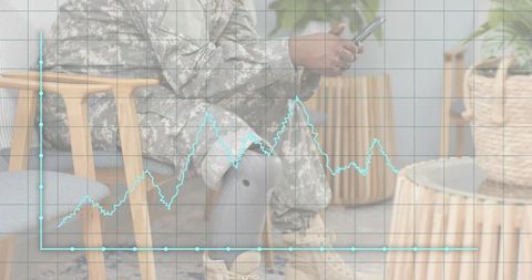 Veteran Sitting with Prosthetic Leg Holding Phone in Waiting Lounge with Rehab Chart Overlay