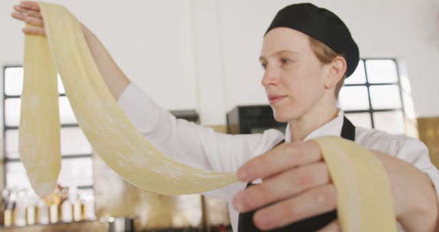 Chef Stretching Fresh Pasta Dough in Professional Kitchen - Download Free Stock Images Pikwizard.com