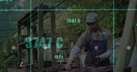 Artisan at work with digital data overlay in rustic workshop