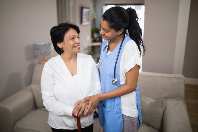 Young Nurse Assisting Elderly Woman at Home - Download Free Stock Photos Pikwizard.com