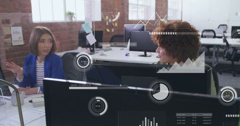 Diverse Female Team Discussing Work with Data Overlay in Modern Office