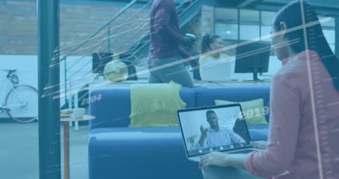 Overlayed Financial Data in Modern Coworking Space