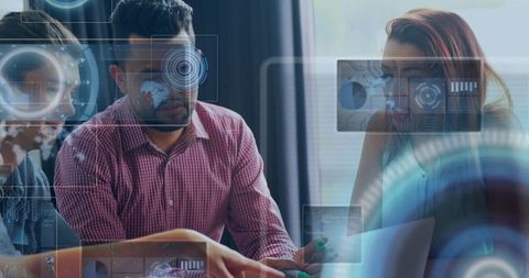 Team collaboration with digital interface in modern boardroom