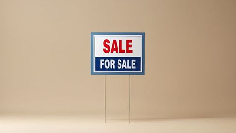 Minimalist for sale sign in soft beige backdrop
