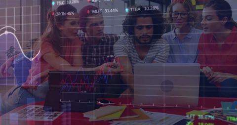 Diverse Team Analyzing Digital Marketing Metrics on Laptop