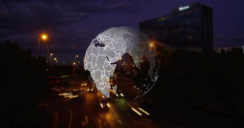 Digital Globe Overlay on Urban Night Traffic