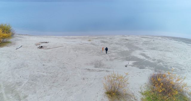 Couple Walking on Tranquil Beach with Blue Waters - Download Free Stock Images Pikwizard.com