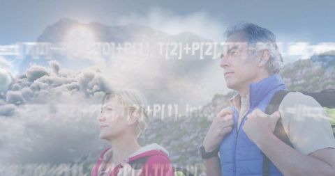 Couple hiking on mountain overlaid with code representing adventure and innovation