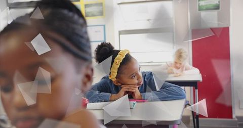 Students Pensive in Classroom with Notebooks and Pencils