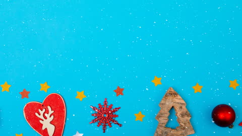 Christmas Decorations with Falling Snow on Blue Background