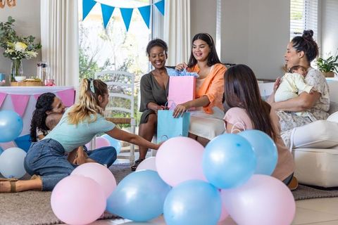 Joyful Baby Shower Celebration with Diverse Friends and Gifts