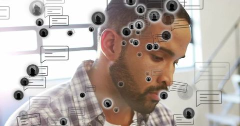 Professional Man Using Laptop with Digital Communications Overlay