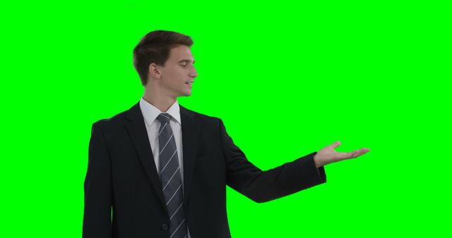 Businessman Gesturing Invitation against Green Screen Background - Download Free Stock Images Pikwizard.com