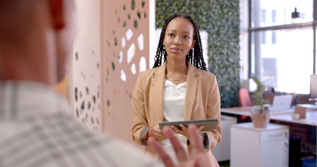 Young Businesswoman Listening in Modern Office - Download Free Stock Images Pikwizard.com