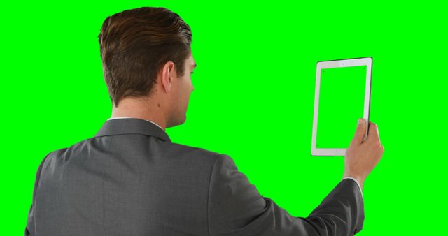 Business Professional Holding Digital Tablet with Green Screen Background - Download Free Stock Images Pikwizard.com