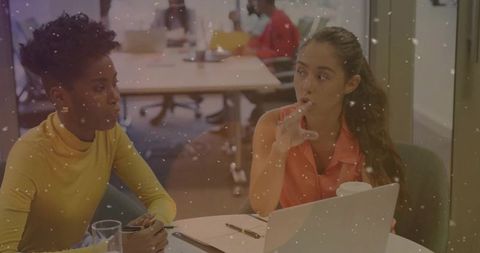 Two Colleagues Having Collaborative Meeting at Office Desk