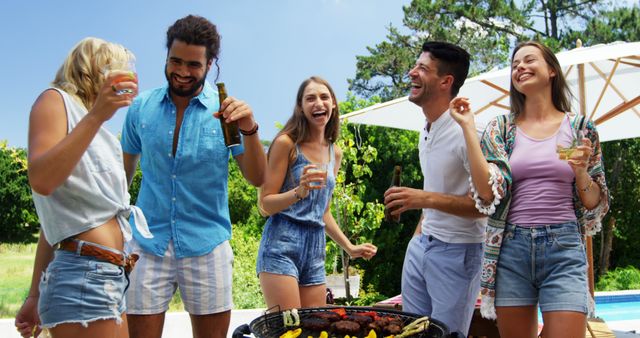 Friends Enjoying Barbecue Party Outdoors on a Sunny Day - Download Free Stock Images Pikwizard.com