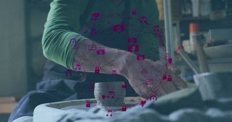 Digital Network Concept Over Hands Crafting Pottery