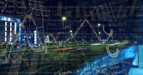 Blending urban night traffic with stock market charts and light trails for fintech concept