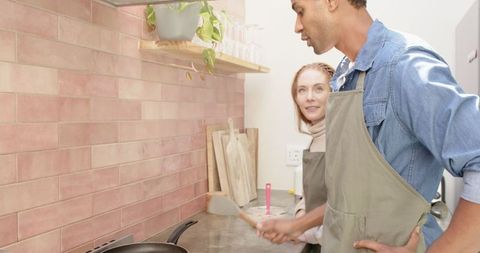 Couple Cooking Together in Modern Kitchen for Quality Time nourishment