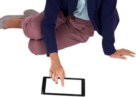Businesswoman kneeling transparent background using tablet