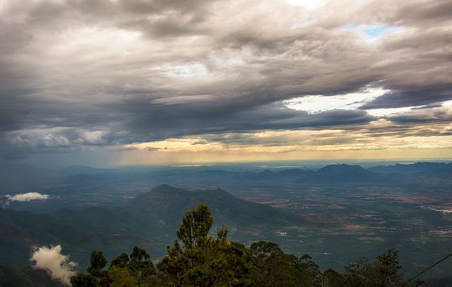 Breathtaking Mountain Range Under Dramatic Cloudy Sky - Download Free Stock Photos Pikwizard.com
