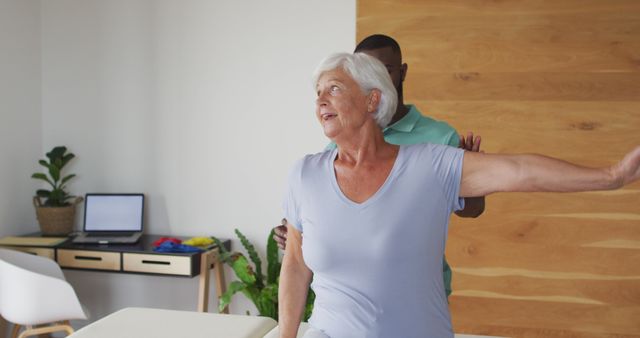 Senior Woman Receiving Physical Therapy in Modern Clinic - Download Free Stock Images Pikwizard.com