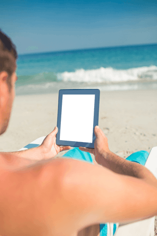 Man Using Tablet with Transparent Screen Relaxing on Beach - Download Free Stock Videos Pikwizard.com
