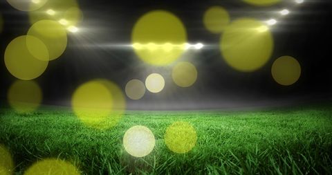 Glowing dots over football stadium for world cup concept