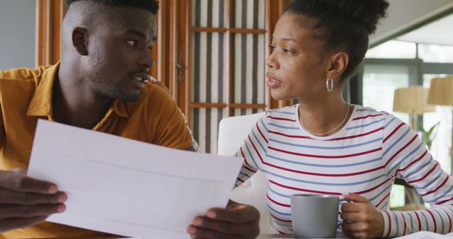Image of focused african american couple planning home budget - Download Free Stock Photos Pikwizard.com
