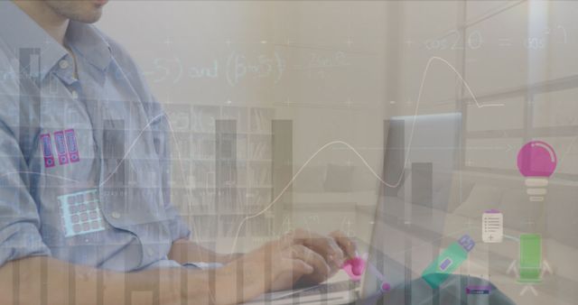 Businessman Working on Laptop with Financial Translucent Graphics - Download Free Stock Images Pikwizard.com