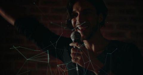 Dynamic Male Singer Enthralling with Digital Network Lines