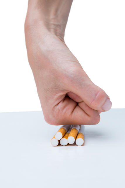 Hand Crushing Cigarettes Concept of Quitting Smoking on Transparent Background - Download Free Stock Videos Pikwizard.com